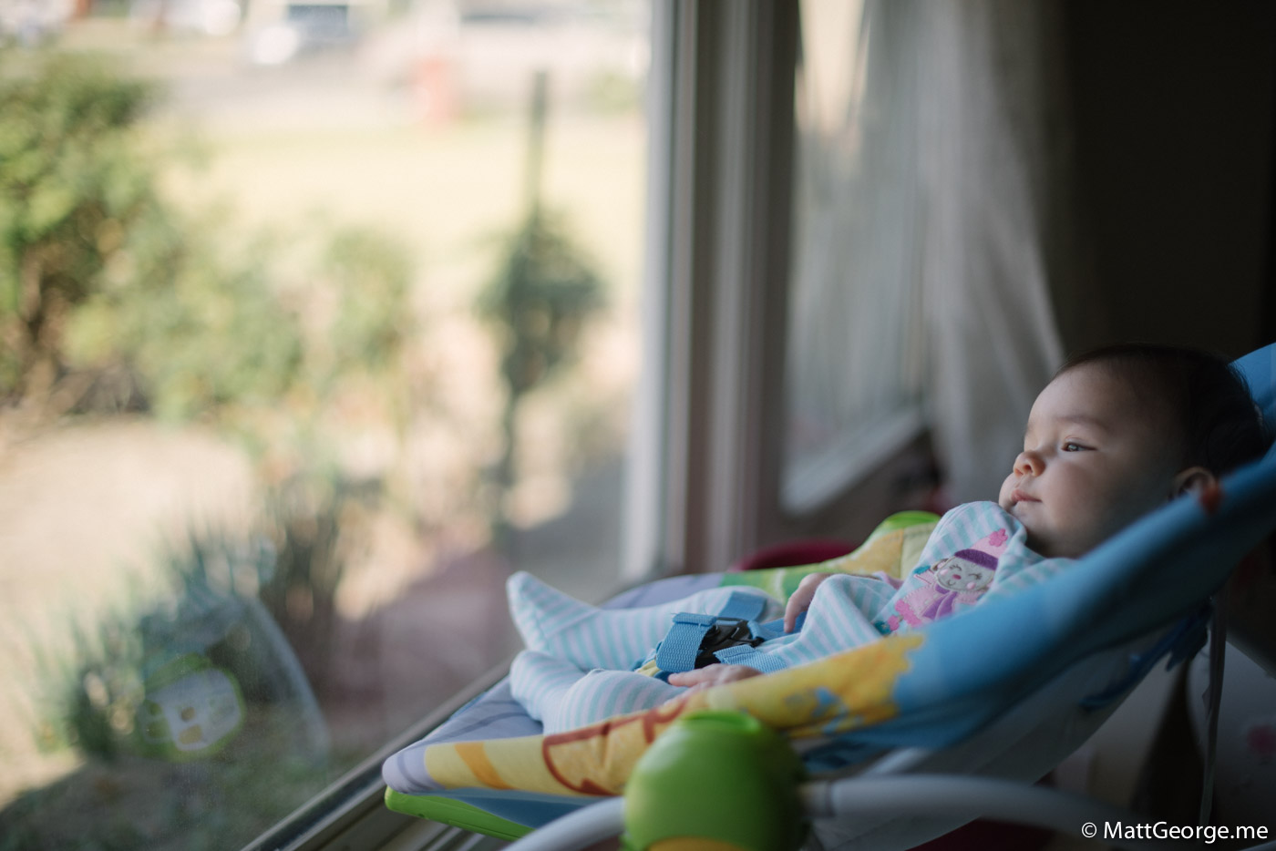 Baby Gianna Looking Out of the Window Sill