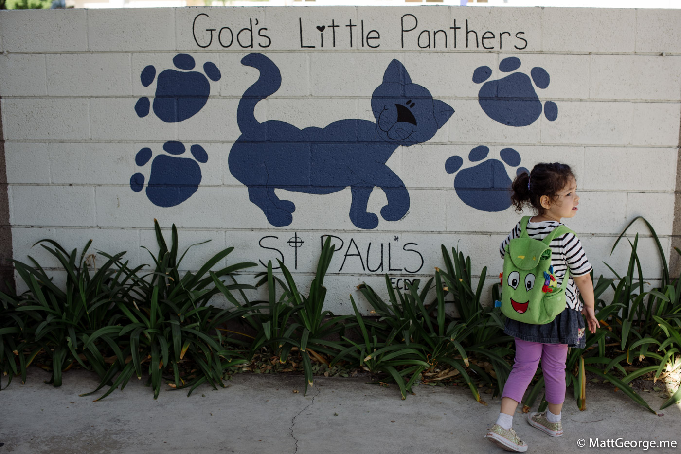 Bella Standing in Front of School Sign