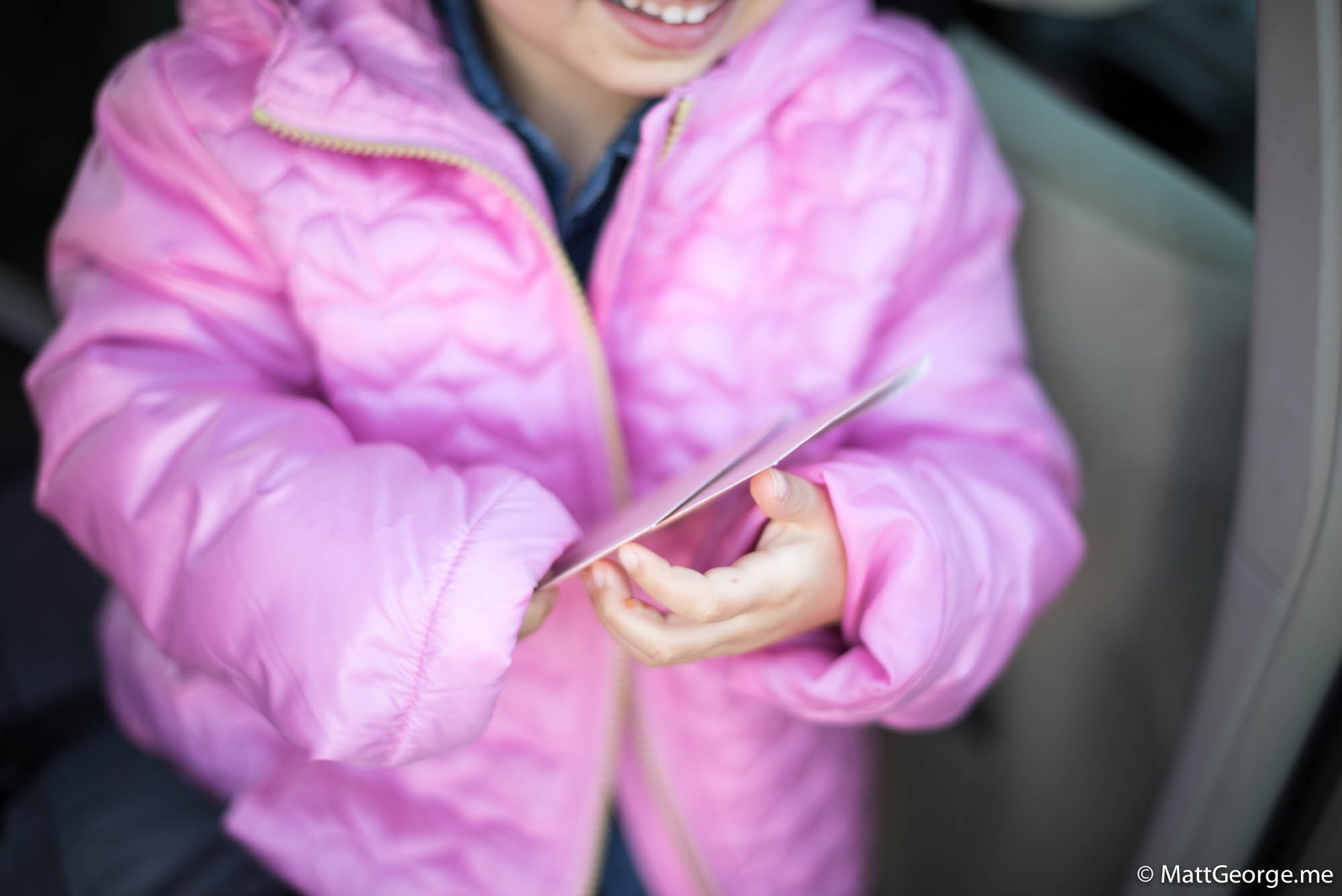 Bella holding cards for her teachers