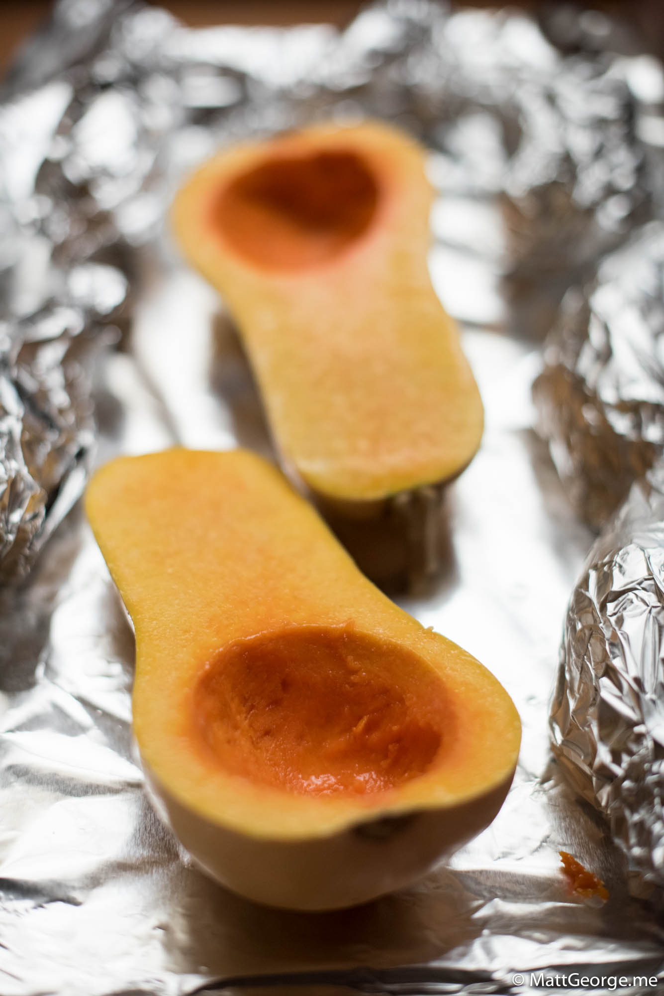 Squash cut in half ready to be cooke din the oven