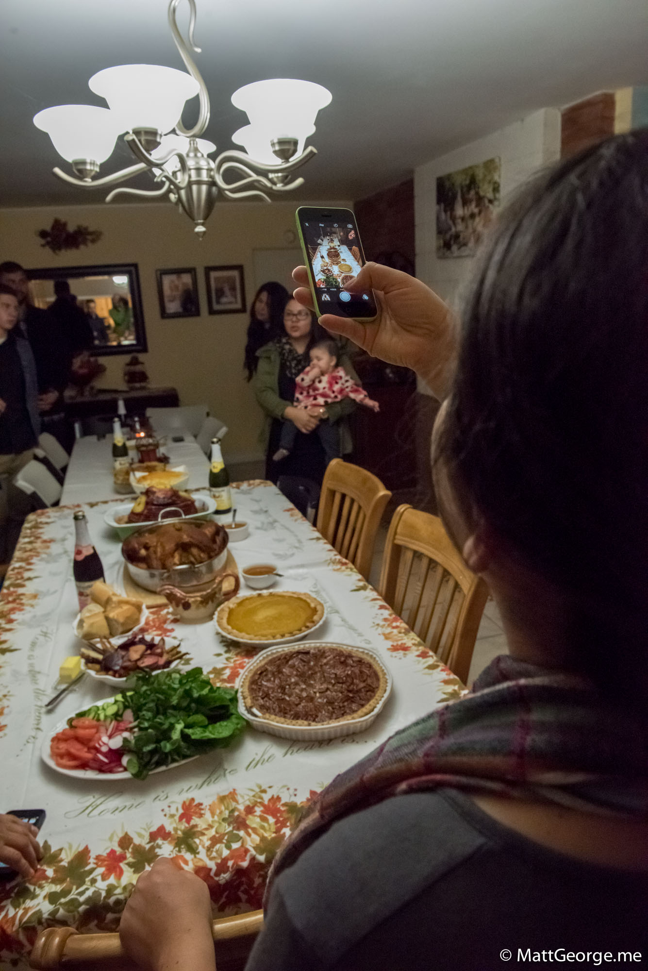 Eugenia Capturing the Food with Her Iphone