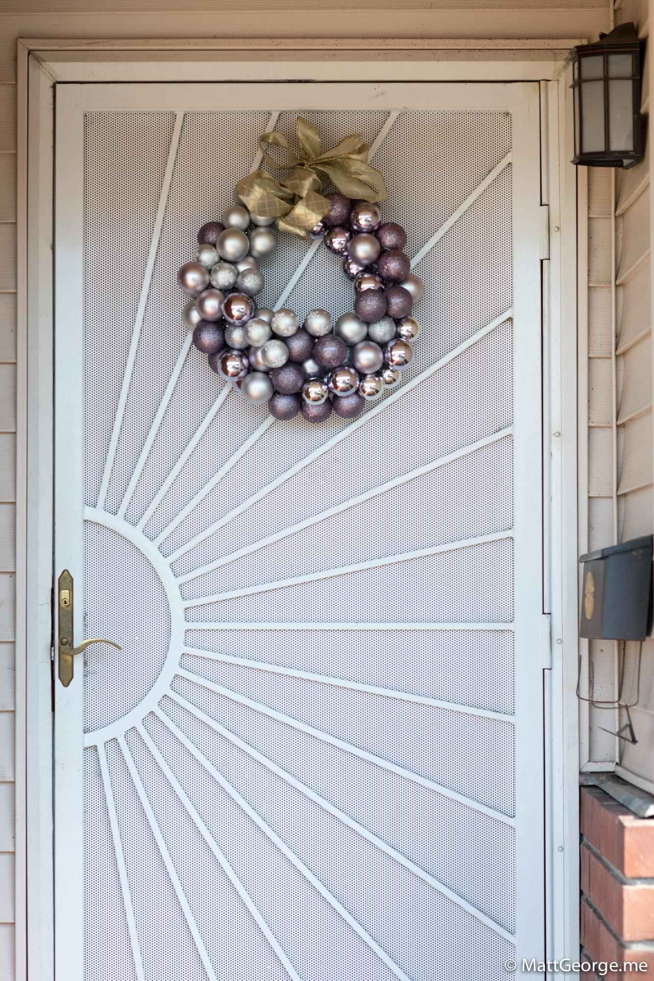 The Christmas Bulb Ornament Finished and Hung on the Door of House