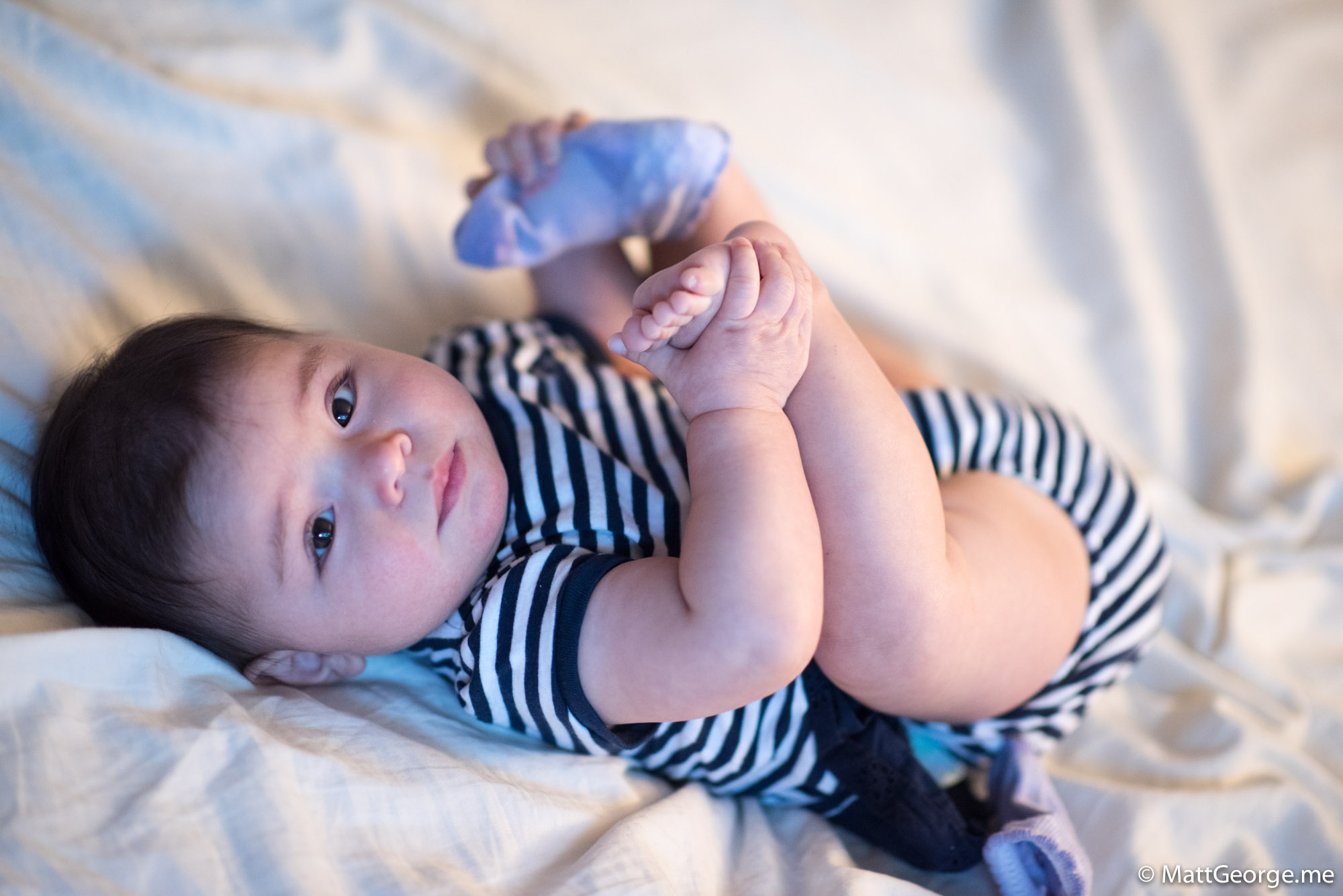 Baby Gianna Playing with Her Feet with One Sock Off