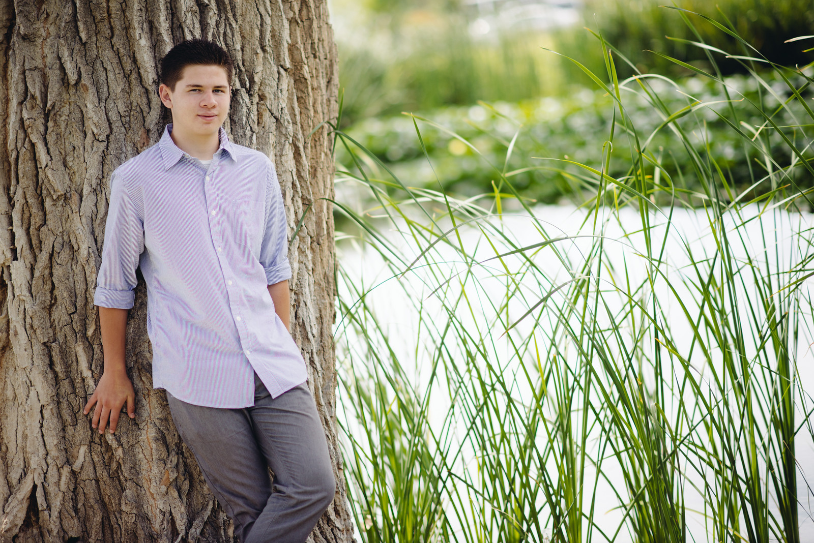 Teenager Guy with Tall Grass and Tree Portrait